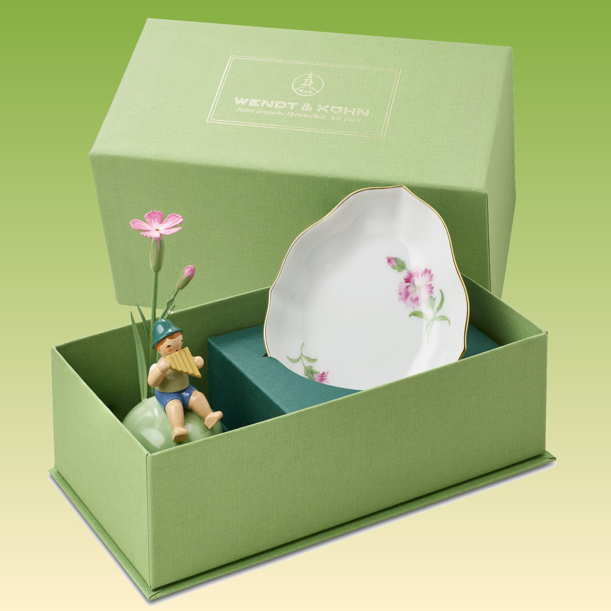 Junge mit Nelke, auf Hügel mit Schale